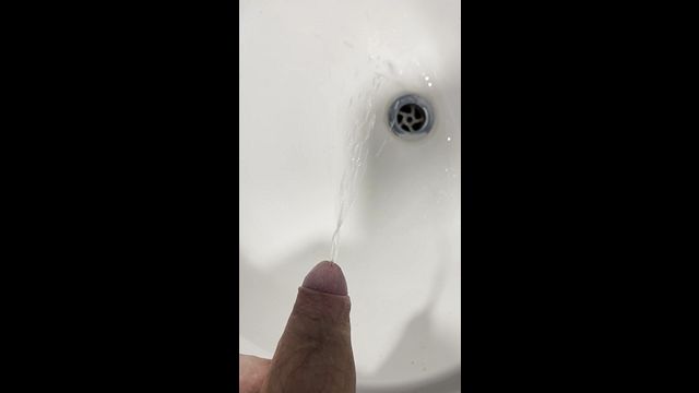 Gay Guy Urinates in Sink for Kinky Thrill