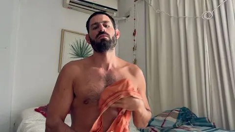 Hunky Guy Sniffs His Musky Body