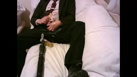 Gay Guy in Suit Wets Himself with Hot Urine