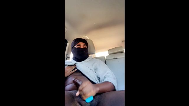 Guy Strokes Big Black Cock in Public