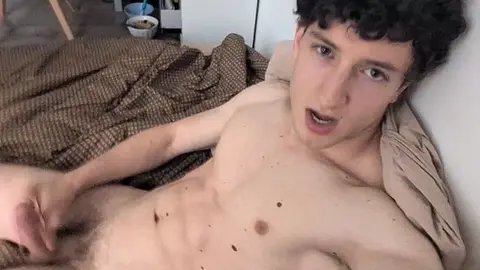 Muscular Young Men Masturbate on Sofa