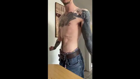 Hairy Tattooed Guy Strokes His Cock