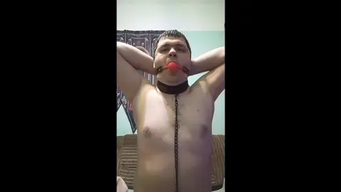 Gagged Slave Submits to Dominant Master