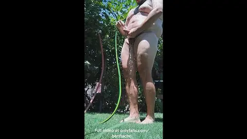 Hairy Bear Takes Outdoor Shower
