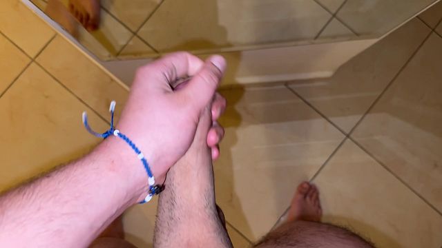 Horny Guy Strokes Big Cock in Hotel Room