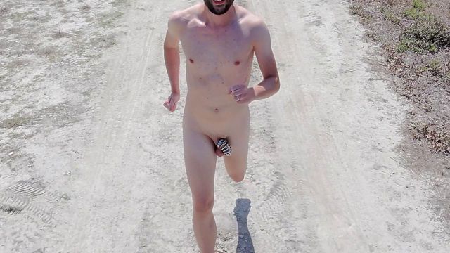 Naked Boy Runs in Chastity Cage
