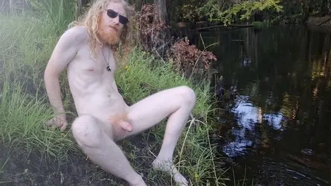 Naked outdoors: Solo masturbation by river