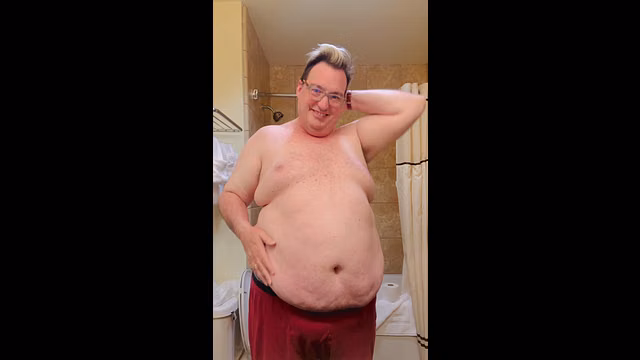 Chubby Man Gets Belly Rub from Partner