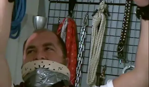 Handsome Men Engage in Rough Bondage Sex