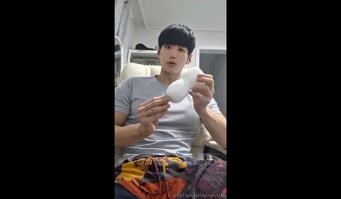 Asian Gay Couple Engage in Passionate Sex