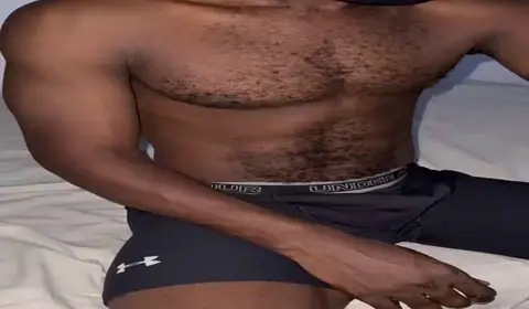 Ebony Muscle Men Engage in Raw Anal Play
