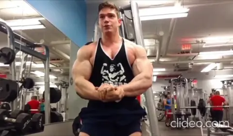 Muscular Men Engage in Reverse Muscle Worship