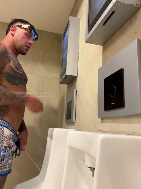 Musclebound Guy Gets Pissed On