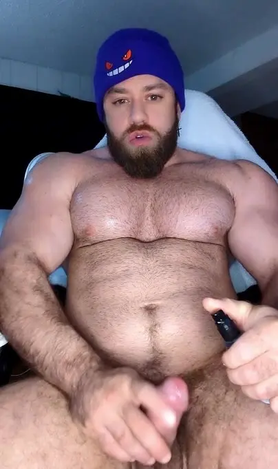 Muscular Guy Plays with Sex Toy