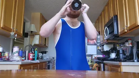 Hunky Guy Drinks Shake in Tight Singlet