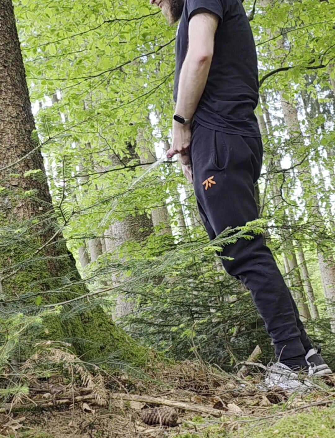 Man Urinates Outdoors in Public