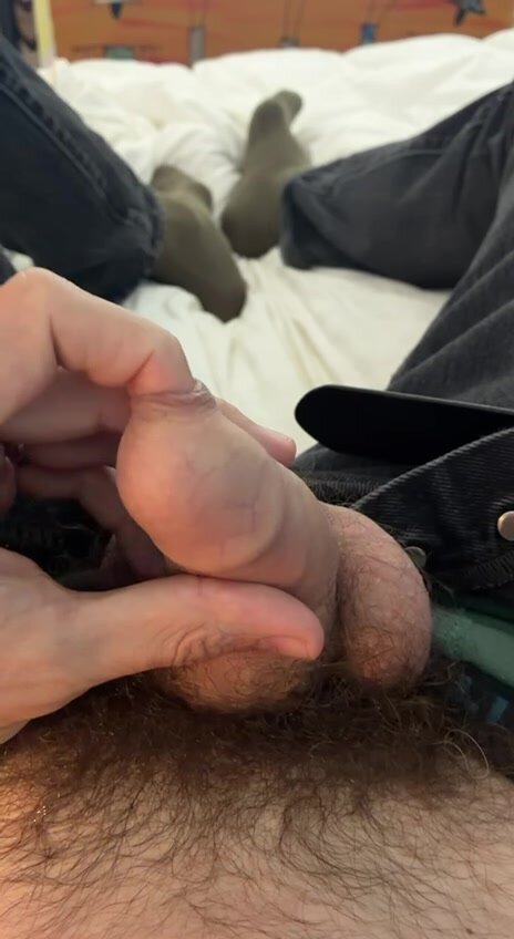 Uncut Guy Strokes Tight Foreskin with Bushy Fingers