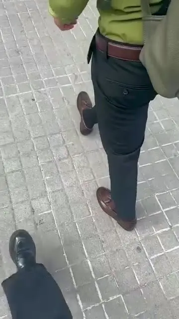 Voyeur Spies on Guy Trying On Shoes
