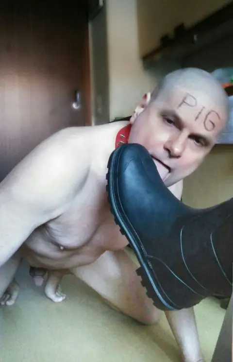 Slave Licks Dirty Boots in Kinky Scene