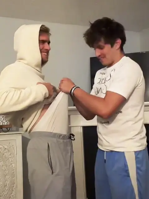 Twink Brother Gets Frontal Wedgie in Whites