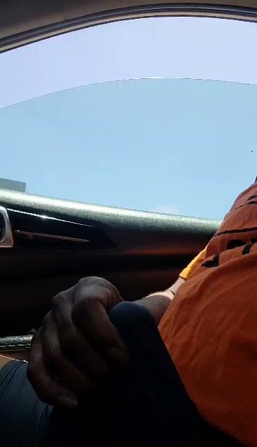 Guy Strokes Bulge in Black Car