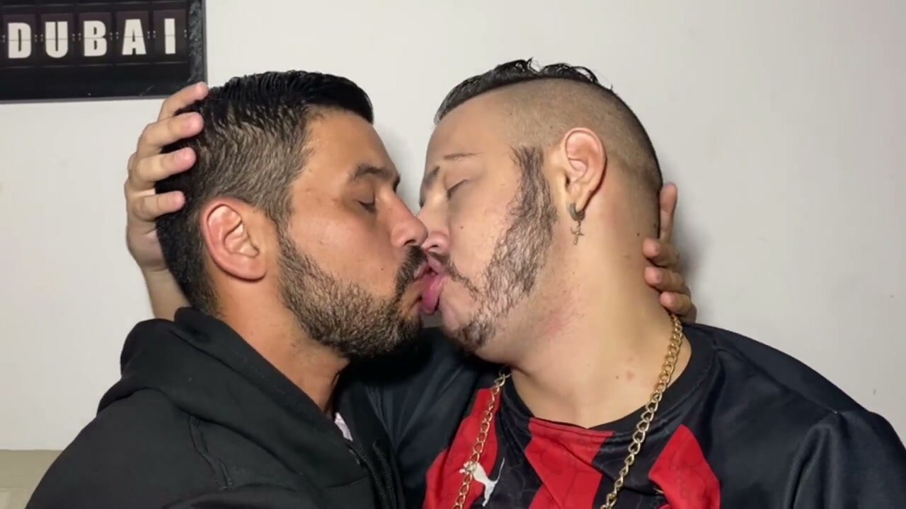 Gay Couples Engage in Passionate Long Tongue Kissing