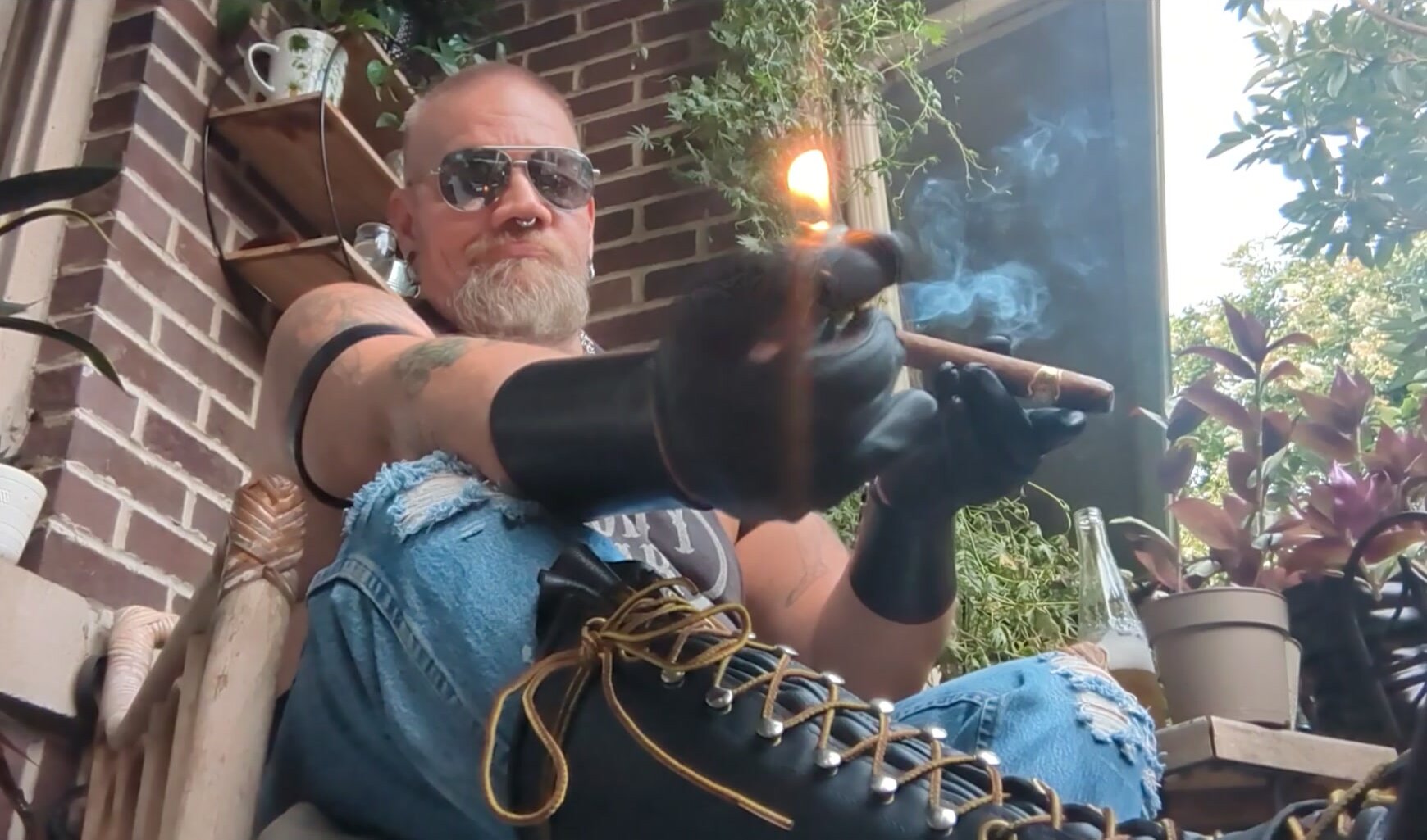 Cigar Smoking Men in Leather Boots Have Fun