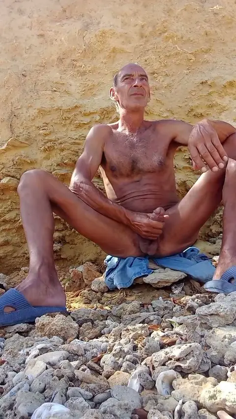 Slim Older Nudist Shows Off Big Cock in Natural Setting