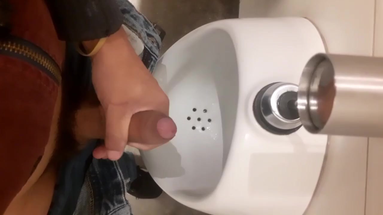 Guy Edges at Public Urinal for Thrilling Release