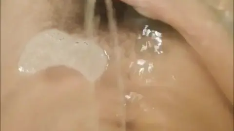Gay Guy Urinates While Stroking Large Cock