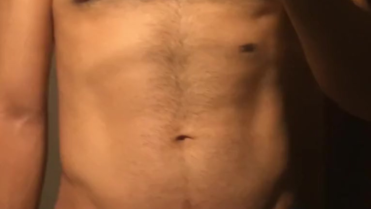 Man Shows Off Bulge in Shorts