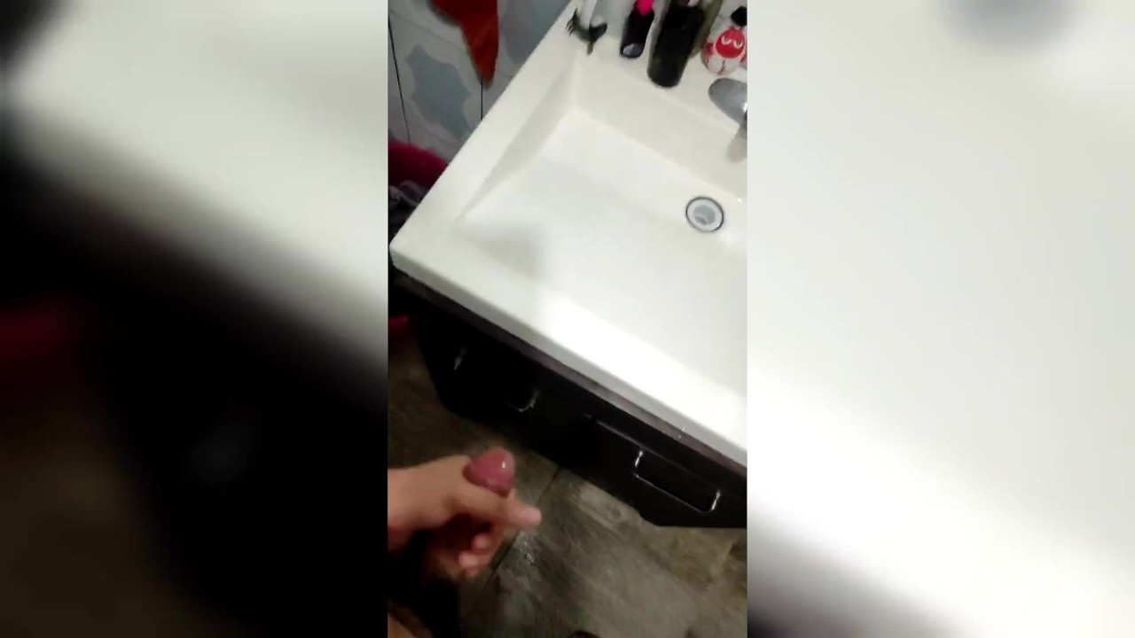 Guy Masturbates in Bathroom with Visitors Outside