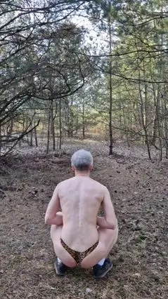 Guy in Thong Does Morning Exercise Outside