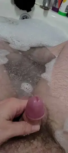 Solo Guy Enjoys Steamy Bath Masturbation