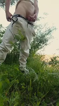 Gay Guy Urinates Outdoors by the Water