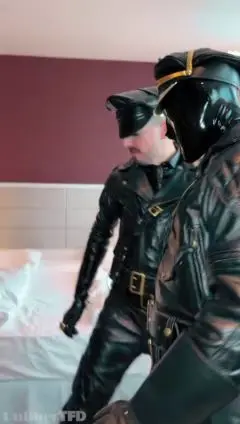 Leather Clad Men Engage in Hardcore Hotel Sex