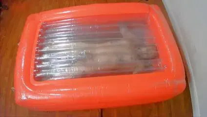 Gay Guy Trapped in Inflatable Gets Fucked