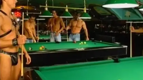 Leather Clad Men Engage in Group Sex