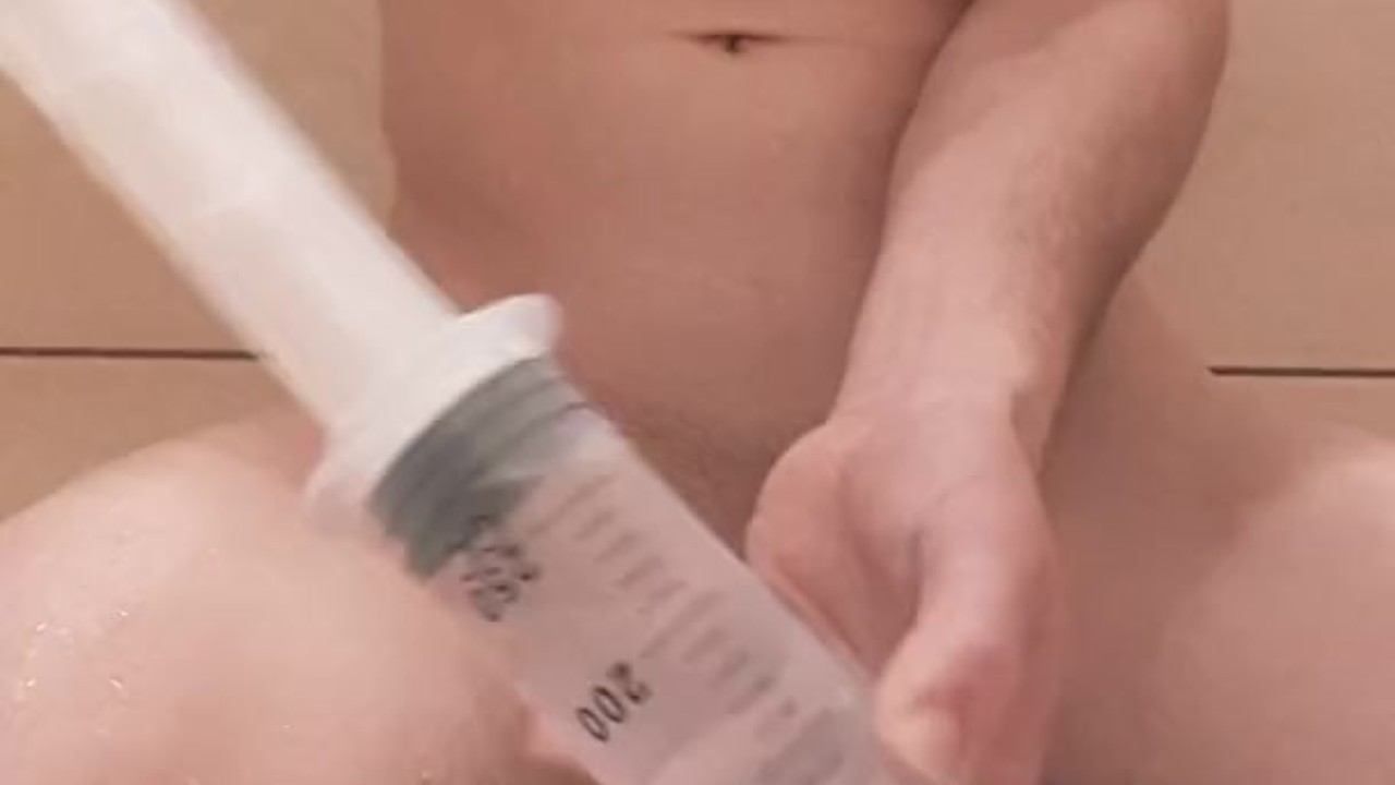 Twink Uses Enema Syringe for Penetration Play