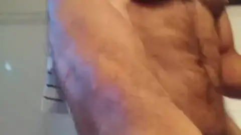 Bodybuilder Jerks Off After Smoking