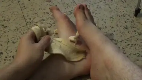 Guy Gives Footjob with Banana