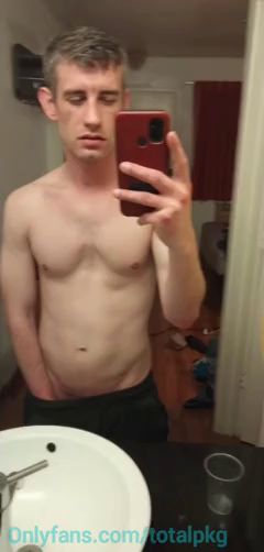 Guy Strips Naked in Front of Mirror
