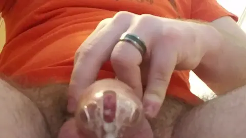 Dude Cums Through Chastity Cage