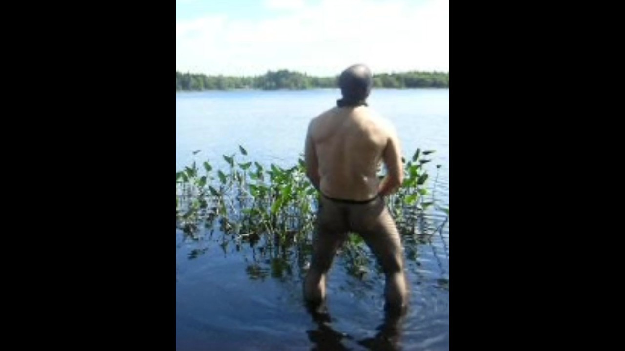 Guy in Fishnet Pantyhose Jerks Off in Lake Wearing Mask