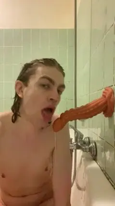 Men Have Fun in Caged Shower