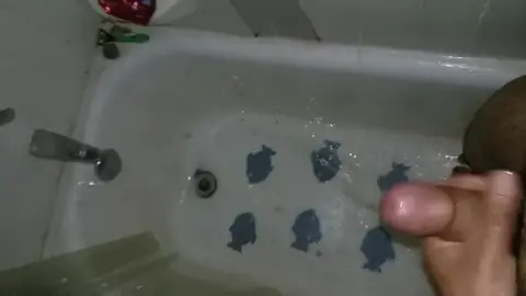 Gay Men Engage in Shower Pissing Scene