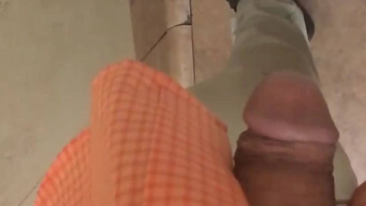 Young Guy Urinates at Workplace