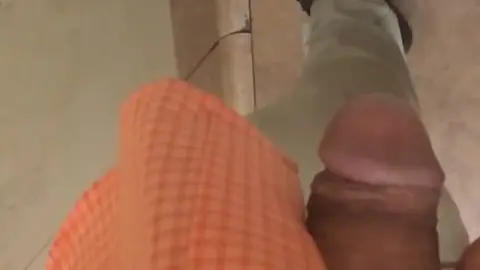 Young Guy Urinates at Workplace
