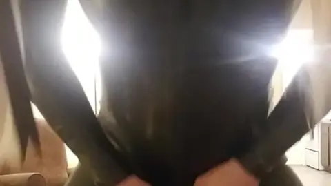 Gay Man Dresses as Rubber Doll for Fetish Play