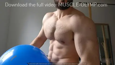 Muscle Man Plays with Smiley Balloon